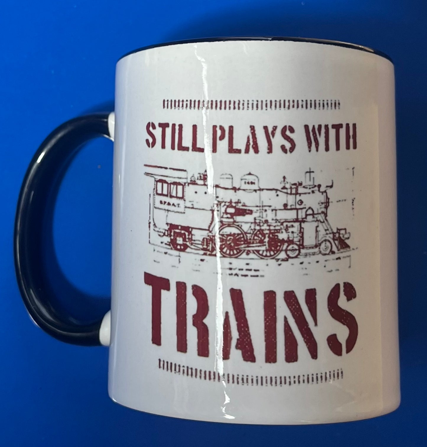 Still Plays with Trains Ceramic Mug